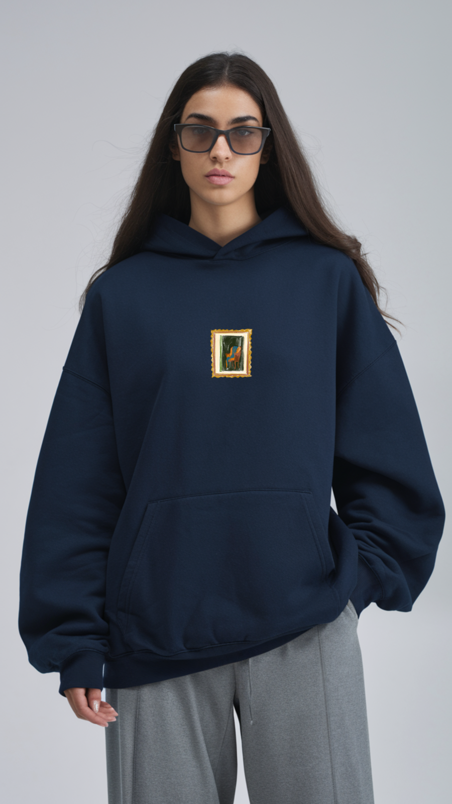 The Frame Focus Hoodie brings a touch of artful elegance to everyday style. Featuring a subtle yet captivating framed design at the center, this hoodie combines classic artistry with modern comfort. Perfect for those who appreciate unique, thoughtful details, the Frame Focus Hoodie serves as both a statement piece and a cozy essential. Its minimalist approach highlights the framed artwork, drawing attention to intricate creativity while maintaining a versatile aesthetic. Step out in style and celebrate the fusion of fashion and art with this refined hoodie.